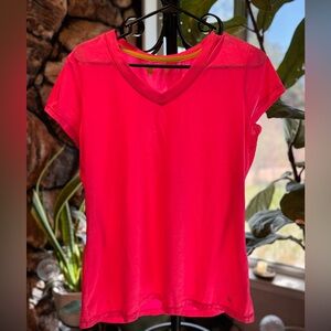 Hot pink breathable workout shirt.